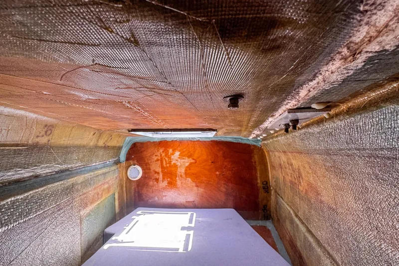 Wanderlust Yacht Photos Pics Interior view of a 2020 Lagoon 40 catamaran hull, showcasing fiberglass construction details.