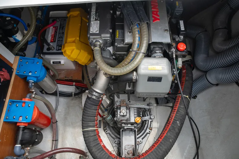 Wanderlust Yacht Photos Pics Engine compartment of a 2020 Lagoon 40 catamaran, featuring Yanmar engine and various components.