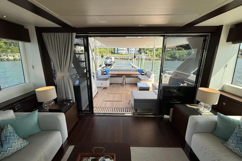  Yacht Photos Pics Luxurious interior of 2021 Sunseeker 76 Yacht with elegant seating and scenic water views.