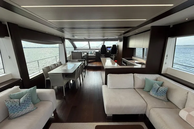  Yacht Photos Pics Luxurious interior of 2021 Sunseeker 76 Yacht with modern furnishings and ocean view.
