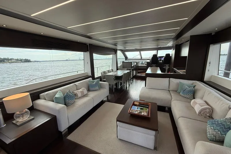  Yacht Photos Pics Luxurious interior of 2021 Sunseeker 76 Yacht with elegant seating and ocean view.