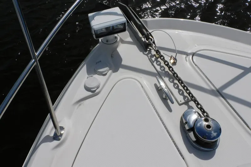 Full Deck Yacht Photos Pics Bow of 2008 Sea Ray 44 Sedan Bridge with anchor chain and railing.