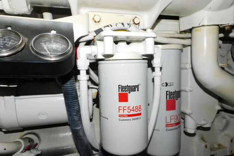 Full Deck Yacht Photos Pics Engine compartment of 2008 Sea Ray 44 Sedan Bridge with Fleetguard filters and gauges.
