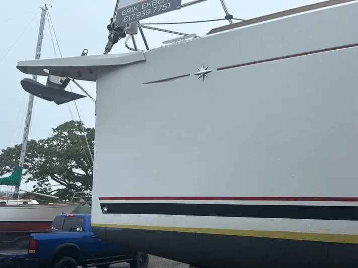 Statira Yacht Photos Pics 2017 Jeanneau Sun Odyssey 389 sailboat on land, with visible anchor and hull details.