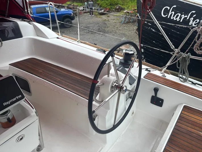 Statira Yacht Photos Pics 2017 Jeanneau Sun Odyssey 389 cockpit with steering wheel and Raymarine equipment.
