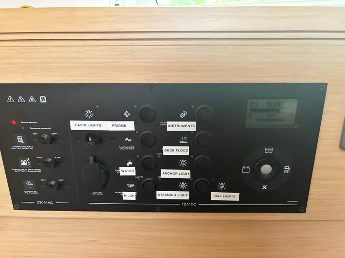 Statira Yacht Photos Pics Control panel of 2017 Jeanneau Sun Odyssey 389 sailboat, featuring various switches and indicators.