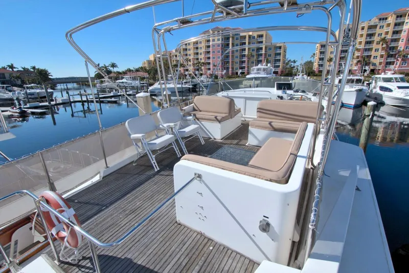 Magic Yacht Photos Pics Flybridge of 1996 Grand Banks 46 Europa yacht docked in a marina.