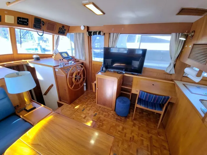 Magic Yacht Photos Pics Interior of 1996 Grand Banks 46 Europa yacht with wooden decor and modern amenities.