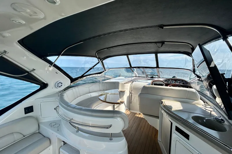 Done Deal Yacht Photos Pics Luxurious interior of 2002 Regal Commodore 3860 yacht with ocean view.