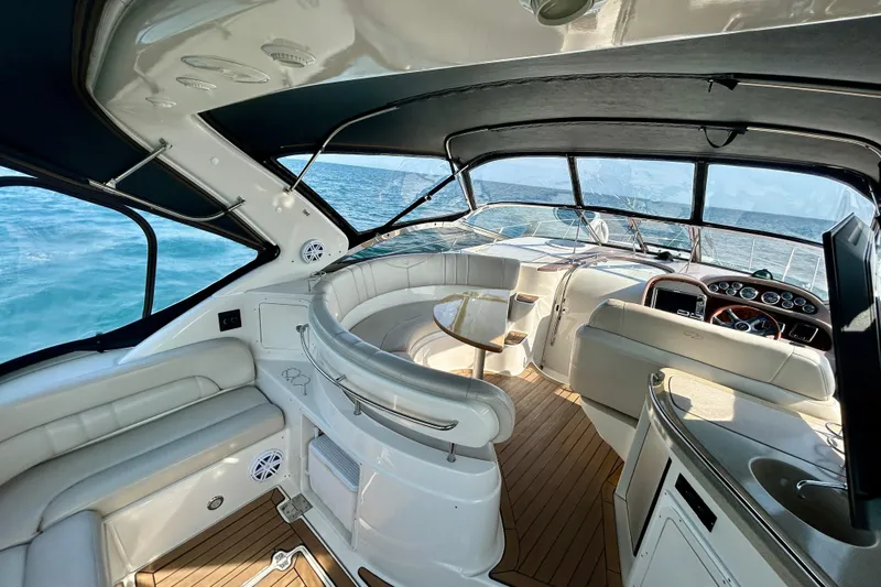 Done Deal Yacht Photos Pics Luxurious interior of 2002 Regal Commodore 3860 yacht with ocean view.