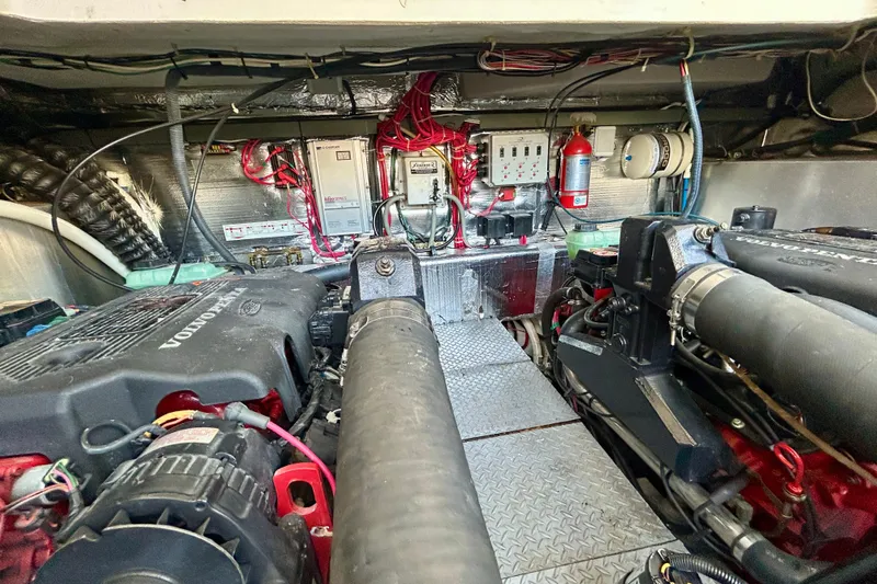 Done Deal Yacht Photos Pics Engine room of 2002 Regal Commodore 3860 with Volvo Penta engines and electrical systems.
