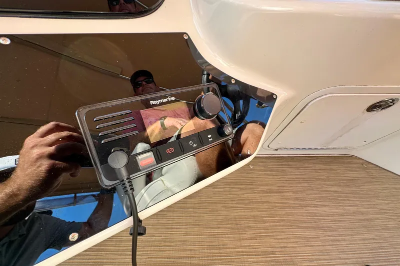 Lighten Up Yacht Photos Pics Raymarine control panel on 2003 Sea Ray 400 Sedan Bridge yacht dashboard.