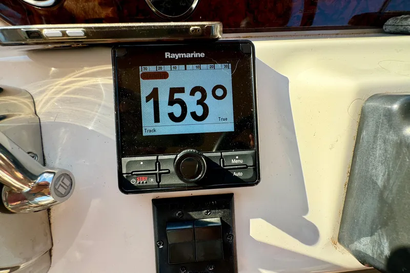 Lighten Up Yacht Photos Pics Raymarine display showing 153 degrees on 2003 Sea Ray 400 Sedan Bridge.