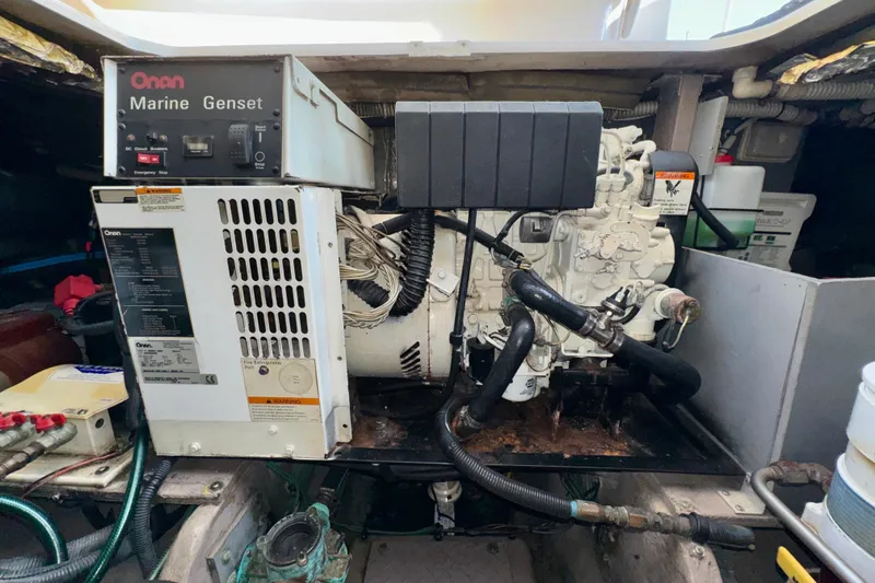 Lighten Up Yacht Photos Pics Onan marine generator in a 2003 Sea Ray 400 Sedan Bridge engine room.