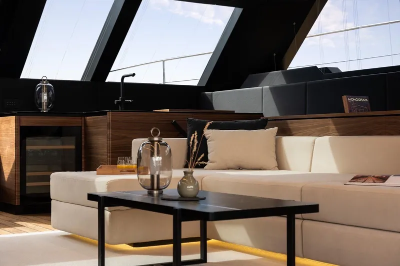 Double Happiness Yacht Photos Pics Luxurious interior of 2024 Sunreef 60 yacht with modern furnishings and large windows.