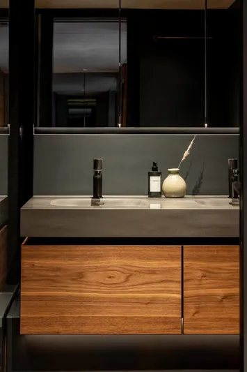 Double Happiness Yacht Photos Pics Modern bathroom vanity on 2024 Sunreef 60 yacht with wood cabinets and sleek design.