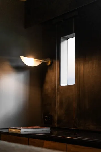 Double Happiness Yacht Photos Pics Interior of 2024 Sunreef 60 yacht with modern lighting and sleek design.