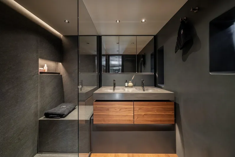 Double Happiness Yacht Photos Pics Luxurious bathroom interior on 2024 Sunreef 60 yacht, featuring modern design and elegant fixtures.