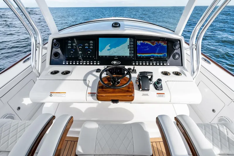  Yacht Photos Pics Helm of 2026 Valhalla Boatworks V-46 with advanced navigation displays and controls.