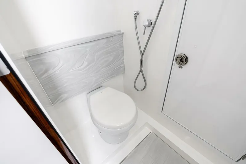  Yacht Photos Pics Modern bathroom in 2026 Valhalla Boatworks V-46, featuring sleek design and fixtures.