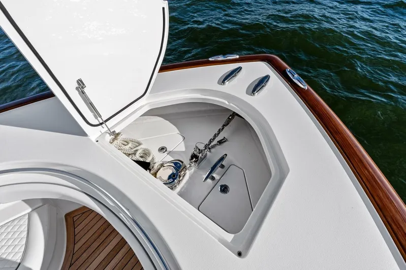  Yacht Photos Pics 2026 Valhalla Boatworks V-46 anchor locker with ropes and chain, open on calm water.