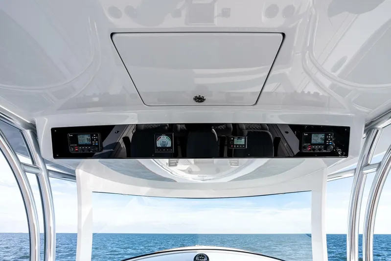  Yacht Photos Pics 2026 Valhalla Boatworks V-46 helm with advanced navigation displays, overlooking the ocean.