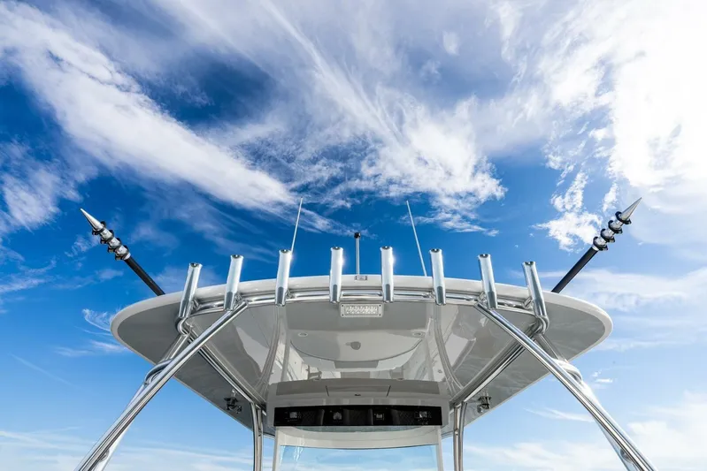  Yacht Photos Pics 2026 Valhalla Boatworks V-46 with sleek design against a vibrant blue sky.