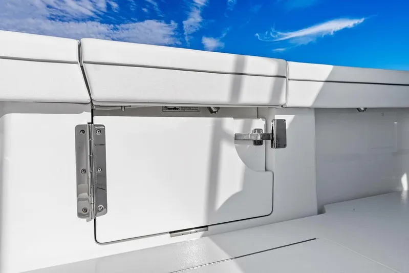  Yacht Photos Pics 2026 Valhalla Boatworks V-46 deck detail with storage compartment under clear blue sky.