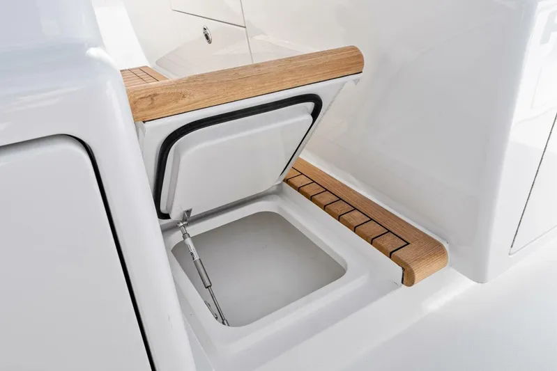  Yacht Photos Pics 2026 Valhalla Boatworks V-46 storage compartment with wooden trim detail.