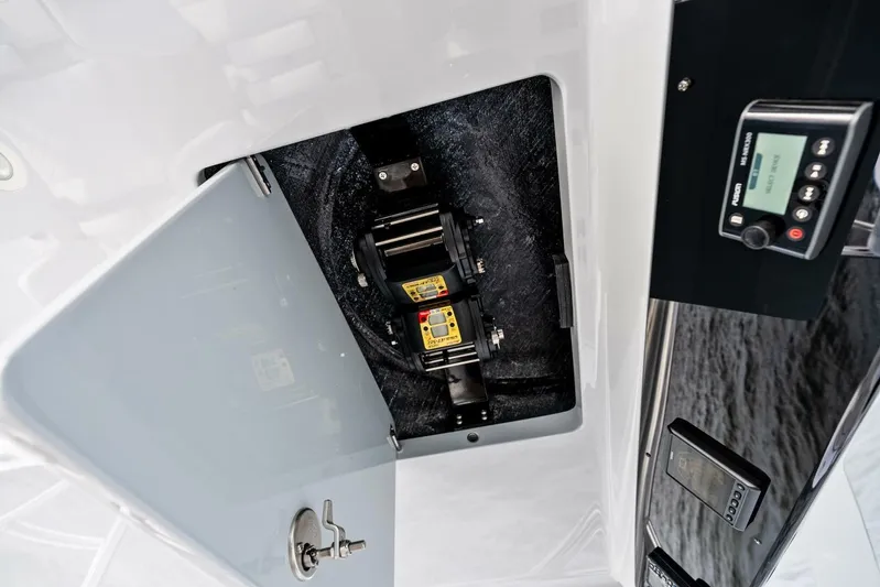  Yacht Photos Pics 2026 Valhalla Boatworks V-46 interior compartment with control panel and equipment.