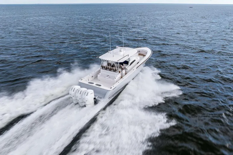  Yacht Photos Pics 2026 Valhalla Boatworks V-46 cruising swiftly on open water.