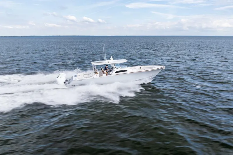  Yacht Photos Pics 2026 Valhalla Boatworks V-46 cruising swiftly on open water.