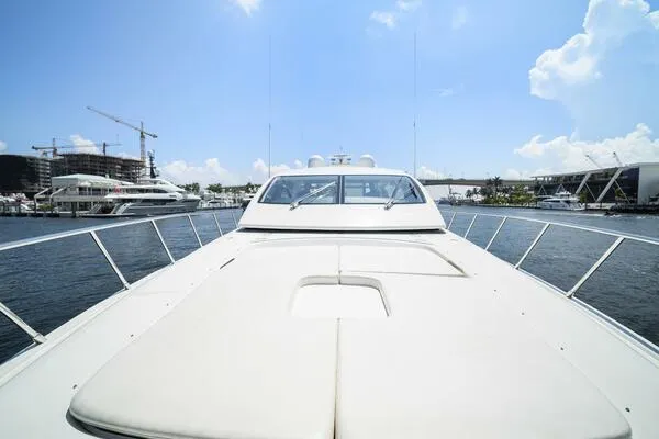  Yacht Photos Pics Mangusta 72 Open 2001 yacht on water, sunny day, marina background.