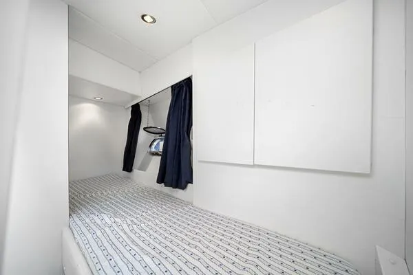  Yacht Photos Pics Cozy cabin interior of 2001 Mangusta 72 Open yacht with modern design.