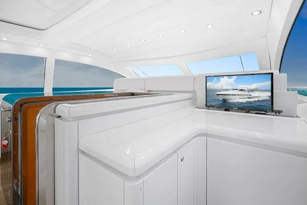  Yacht Photos Pics Luxurious interior of 2001 Mangusta 72 Open yacht with sleek design and ocean view.