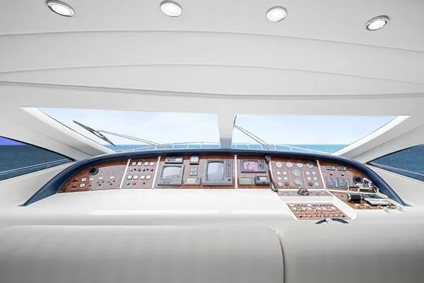  Yacht Photos Pics Cockpit of 2001 Mangusta 72 Open yacht with modern navigation controls.