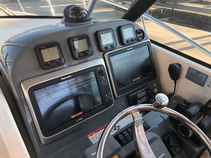  Yacht Photos Pics Dashboard of a 2007 Pursuit 335 Offshore boat with navigation equipment.
