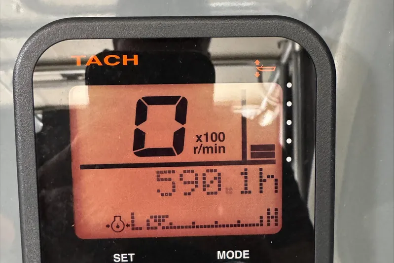  Yacht Photos Pics Tachometer display showing 0 RPM and 590.1 hours on a 2007 Pursuit OS 335 Offshore.