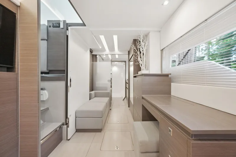 Freedom Yacht Photos Pics Modern interior of 2022 Leopard 53 Powercat yacht with sleek design and natural light.