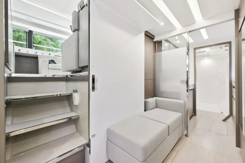Freedom Yacht Photos Pics Modern interior of 2022 Leopard 53 Powercat yacht with sleek design and comfortable seating.
