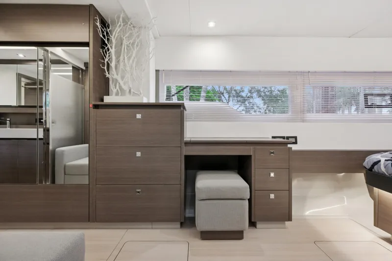 Freedom Yacht Photos Pics Luxurious interior of 2022 Leopard 53 Powercat with modern wood furnishings and natural light.