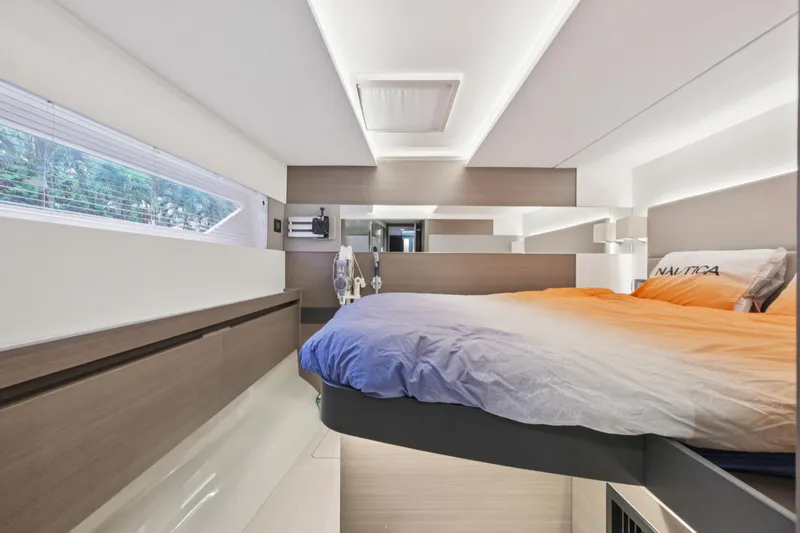 Freedom Yacht Photos Pics Luxurious interior of 2022 Leopard 53 Powercat yacht with modern bedroom design.