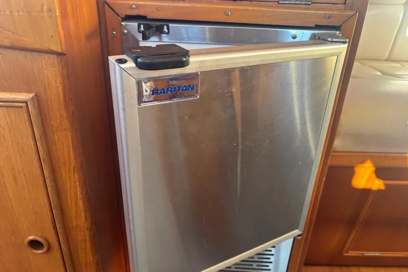 Maximon Yacht Photos Pics Stainless steel Raritan fridge in 1989 Grand Banks 46 yacht interior.