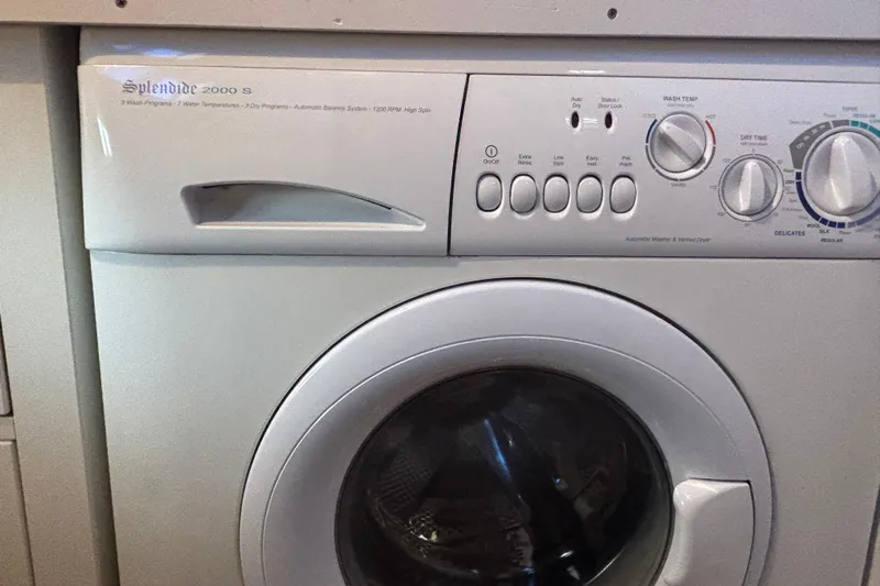 Maximon Yacht Photos Pics Splendide 2000 S washing machine with control panel, buttons, and dials, on a Grand Banks 46 yacht.