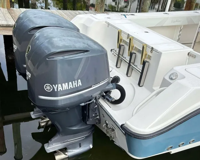  Yacht Photos Pics 2012 Edgewater 318CC boat with dual Yamaha outboard motors docked.