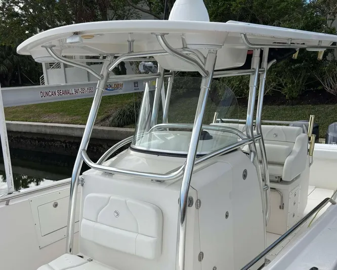  Yacht Photos Pics 2012 Edgewater 318CC boat with sleek design and sturdy T-top.