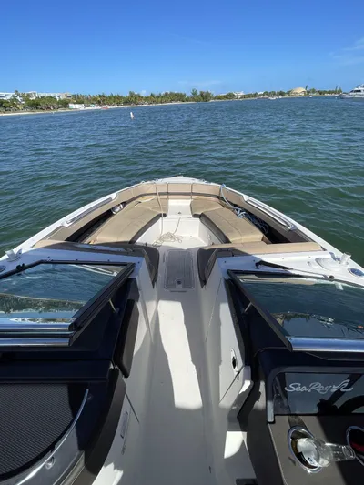  Yacht Photos Pics 2018 Sea Ray 310 SLX boat on water, featuring spacious seating and sleek design.