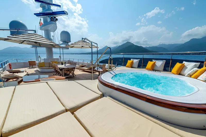 Baron Trenck Yacht Photos Pics Luxurious Eurocraft SUPERYACHT 43.5 (2011) deck with jacuzzi, sun loungers, and ocean view.
