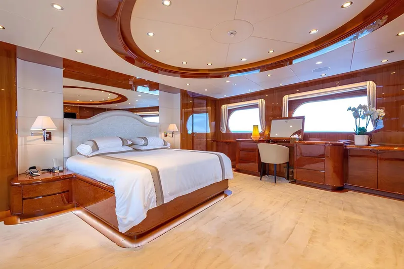 Baron Trenck Yacht Photos Pics Luxurious bedroom interior on 2011 Eurocraft SUPERYACHT 43.5 with elegant wood finishes.