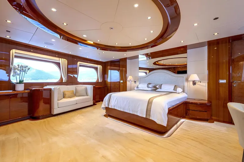 Baron Trenck Yacht Photos Pics Luxurious Eurocraft SUPERYACHT 43.5 bedroom interior, 2011 model, featuring elegant wood finishes and plush bedding.